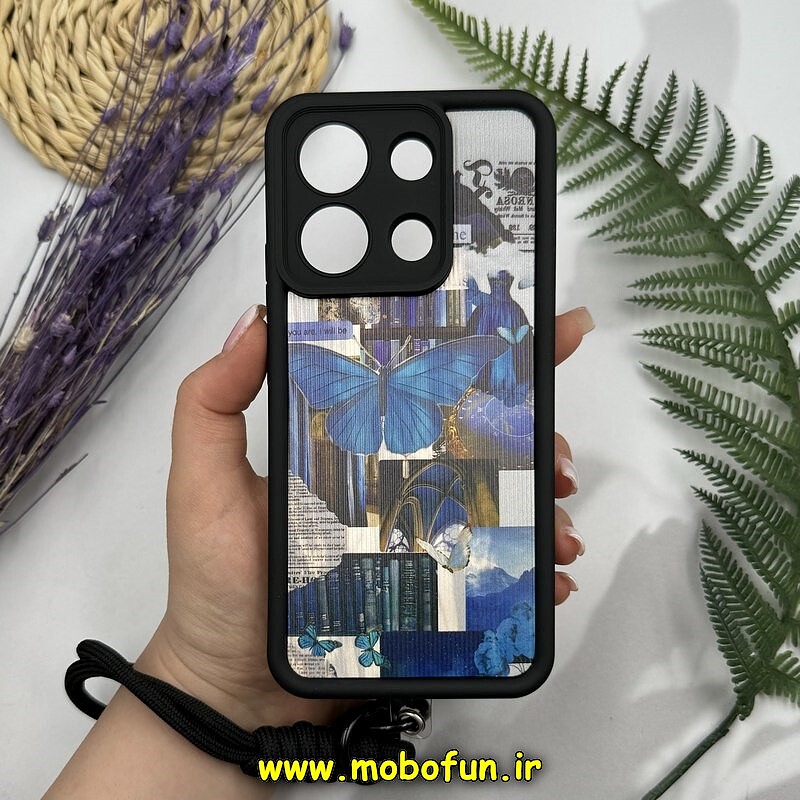 قاب گوشی Redmi Note 13 4G شیائومی طرح سیلیکونی Solid چرمی کبریتی محافظ لنزدار بند دار کنفی طرح پروانه آبی کد 14091