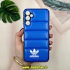 قاب گوشی Galaxy A15 سامسونگ پافر چرمی فانتزی Hard محافظ لنز دار طرح Adidas کد 16030