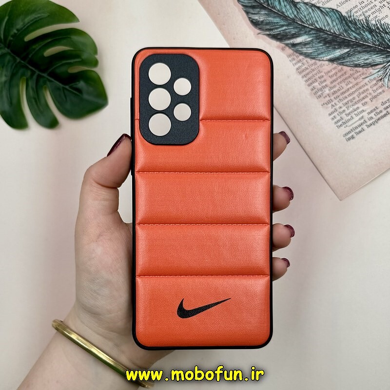 قاب گوشی Galaxy A33 سامسونگ پافر چرمی فانتزی Hard محافظ لنز دار طرح NIKE نارنجی کد 16050