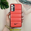 قاب گوشی Galaxy A34 سامسونگ پافر چرمی فانتزی Hard محافظ لنز دار طرح NIKE نارنجی کد 16055