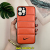 قاب گوشی iPhone 12 Pro Max آیفون پافر چرمی فانتزی Hard محافظ لنز دار طرح NIKE نارنجی کد 16106