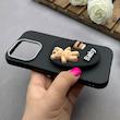قاب گوشی iPhone 16 Pro آیفون لدر دیزاین SOFT Lether Design سیلیکونی پاپ سوکت دار عروسکی طرح چرم مشکی کد 83383