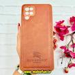 قاب گوشی Galaxy A12 / Galaxy M12 سامسونگ اورجینال برند BURBERRY 2026 طرح دوخت HARD چرمی محافظ لنزدار عسلی کد 91035