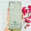 قاب گوشی Galaxy A13 4G سامسونگ اورجینال برند BURBERRY 2026 طرح دوخت HARD چرمی محافظ لنزدار خاکستری کد 91038