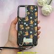 قاب گوشی Galaxy A15 سامسونگ لدر دیزاین SOFT Lether Design فانتزی سیلیکونی طرح چرمی دارای آویزبند با گل های کیوت مشکی کد 1-15-102201