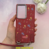 قاب گوشی Galaxy S25 Ultra سامسونگ لدر دیزاین SOFT Lether Design فانتزی سیلیکونی طرح چرمی دارای آویزبند با گل های کیوت قرمز کد 1-15-102216