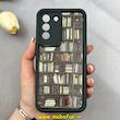 قاب گوشی Galaxy S21 FE سامسونگ سیلیکونی Solid فانتزی چاپی محافظ لنزدار درجه یک طرح کتابخانه مشکی کد 103653