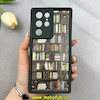 قاب گوشی Galaxy S22 Ultra سامسونگ سیلیکونی Solid فانتزی چاپی محافظ لنزدار درجه یک طرح کتابخانه مشکی کد 103659