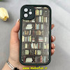 قاب گوشی iPhone 11 آیفون سیلیکونی Solid فانتزی چاپی محافظ لنزدار درجه یک طرح کتابخانه مشکی کد 103663