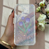 قاب گوشی iPhone 16 آیفون طلقی شفاف هولوگرامی طرح سه بعدی قلبی گل لاله کد 104517