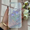 قاب گوشی iPhone 15 آیفون طلقی شفاف هولوگرامی طرح سه بعدی قلبی گل لاله کد 104524