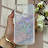 قاب گوشی iPhone 12 / iPhone 12 Pro آیفون طلقی شفاف هولوگرامی طرح سه بعدی قلبی گل لاله کد 104544