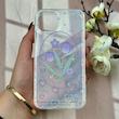 قاب گوشی iPhone 13 / iPhone 14 آیفون طلقی شفاف هولوگرامی طرح سه بعدی قلبی گل لاله کد 104552