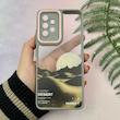 قاب گوشی Galaxy A32 4G سامسونگ لاین کمرا اورجینال Q Series فانتزی محافظ لنزدار طرح DESERT خاکستری کد 107932