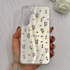 قاب گوشی Galaxy S24 سامسونگ فانتزی براق IMD لیزری لاکچری سخت HARD طرح گل لاله کد 110121