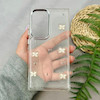 قاب گوشی Galaxy S24 Ultra سامسونگ لاکچری شفاف شاین رزینی لنز کرومی طرح پروانه کد 111725