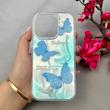 قاب گوشی iPhone 16 Pro آیفون فانتزی براق IMD لیزری لاکچری سخت HARD طرح پروانه کد 112457