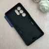 قاب گوشی Galaxy S25 Ultra سامسونگ ضد ضربه بتمن اورجینال Syndee هولدر دار مگنتی محافظ لنز دار کشویی سرمه ای کد 115423