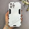 قاب گوشی iPhone 13 Pro Max آیفون ضد ضربه بتمن نیلکین Nillkin هولدر دار محافظ لنز دار سفید کد 115263