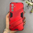 قاب گوشی Galaxy S23 FE سامسونگ ضد ضربه بتمن BIBERCAS هولدر دار محافظ لنز دار قرمز کد 115279