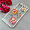 قاب گوشی Galaxy S23 FE سامسونگ لاکچری رزینی گل برجسته شفاف پاستیلی سفید کد 115656