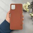قاب گوشی Galaxy A06 سامسونگ اورجینال چرمی سخت Hard سوزنی نیلکین NILLKIN قهوه ای کد 119180