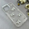 قاب گوشی iPhone 16 Pro Max آیفون لاکچری شفاف شاین رزینی لنز کرومی طرح پاپیون و مروارید برجسته کد 116148