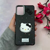 قاب گوشی Galaxy A06 سامسونگ لدرکیس عروسکی فانتزی سیلیکونی برجسته طرح چرمی کیتی Kitty مشکی کد 116407