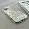 قاب گوشی iPhone 17 آیفون پشت طلق HARD براق IMD فانتزی لیزری کپسولی طرح گل کد E21-120470