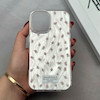 قاب گوشی iPhone 16 آیفون پشت طلق HARD براق IMD فانتزی لیزری کپسولی طرح گل کد E21-120479