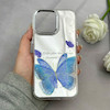 قاب گوشی iPhone 16 Pro Max آیفون اورجینال فانتزی سخت آینه ای لنز کرومی ایربگ دار طرح پروانه کیوت کد 122135