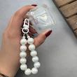کاور AirPods 1 / AirPods 2 ایرپاد اپل لاکچری قلب هولوگرامی شفاف بندآویز مرواریدی کد 98201