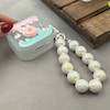 کاور AirPods 4 ایرپاد اپل لاکچری دونات برجسته شفاف بندآویز مرواریدی کد 98216