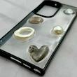 قاب گوشی Galaxy S23 Ultra سامسونگ شفاف رزینی Luxury برجسته طرح کهکشانی لوکس مشکی کد 125812