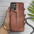 قاب گوشی Galaxy A12 - M12 سامسونگ سری Porsche Design پورش دیزاین Hard LUXURY محافظ لنز دار قهوه ای کد 130541