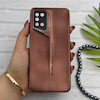 قاب گوشی Galaxy A31 سامسونگ سری Porsche Design پورش دیزاین Hard LUXURY محافظ لنز دار قهوه ای کد 130582
