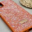 قاب گوشی Galaxy A06 سامسونگ نگین دار سواروسکی SWAROVSKI پلاک فلزی نارنجی کد 151278
