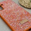 قاب گوشی Galaxy A26 سامسونگ نگین دار سواروسکی SWAROVSKI پلاک فلزی نارنجی کد 151310