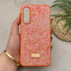 قاب گوشی Galaxy A26 سامسونگ نگین دار سواروسکی SWAROVSKI پلاک فلزی نارنجی کد 151310