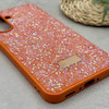 قاب گوشی Galaxy A36 سامسونگ نگین دار سواروسکی SWAROVSKI پلاک فلزی نارنجی کد 151321