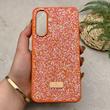 قاب گوشی Galaxy A36 سامسونگ نگین دار سواروسکی SWAROVSKI پلاک فلزی نارنجی کد 151321