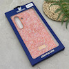 قاب گوشی Galaxy S25 FE سامسونگ نگین دار سواروسکی SWAROVSKI پلاک فلزی نارنجی کد 151348