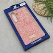 قاب گوشی Galaxy S25 FE سامسونگ نگین دار سواروسکی SWAROVSKI پلاک فلزی نارنجی کد 151348