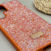 قاب گوشی Galaxy S24 Ultra سامسونگ نگین دار سواروسکی SWAROVSKI پلاک فلزی نارنجی کد 151355