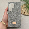 قاب گوشی Galaxy S24 Ultra سامسونگ نگین دار سواروسکی SWAROVSKI پلاک فلزی خاکستری کد 151356