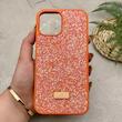 قاب گوشی iPhone 12 Pro Max آیفون نگین دار سواروسکی SWAROVSKI پلاک فلزی نارنجی کد 151372