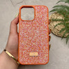 قاب گوشی iPhone 13 Pro Max آیفون نگین دار سواروسکی SWAROVSKI پلاک فلزی نارنجی کد 151377