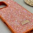 قاب گوشی iPhone 16 Pro Max آیفون نگین دار سواروسکی SWAROVSKI پلاک فلزی نارنجی کد 151397