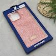 قاب گوشی iPhone 16 Pro Max آیفون نگین دار سواروسکی SWAROVSKI پلاک فلزی نارنجی کد 151397