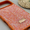 قاب گوشی iPhone 17 Pro Max آیفون نگین دار سواروسکی SWAROVSKI پلاک فلزی نارنجی کد 151404